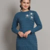 Women’s teal blue winter knitted sweater dress with long sleeves, scalloped hem, and floral appliqué detail Women’s teal blue winter knitted sweater dress with long sleeves, scalloped hem, and floral appliqué detail