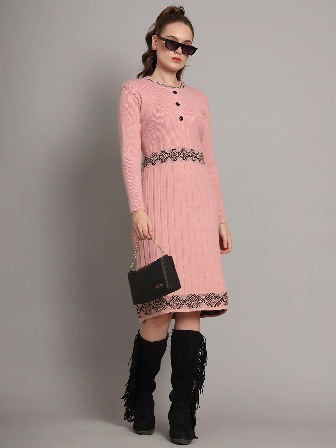 Women’s peach ribbed knit winter jumper dress with embroidered waist and hemline