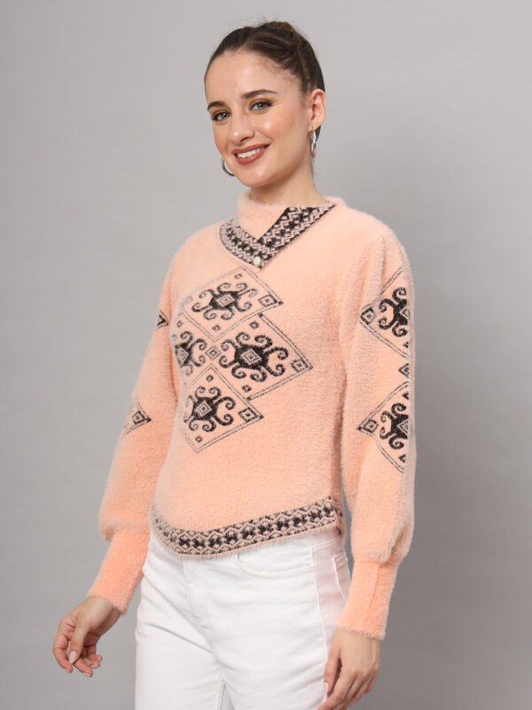 Peach women’s short-length winter sweater top with black ethnic pattern, asymmetric buttoned neckline, and full sleeves