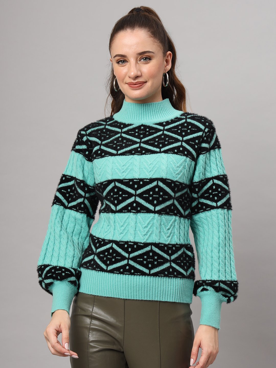 Sea green women’s short-length winter sweater top with black geometric pattern, high ribbed neck, and balloon sleeves
