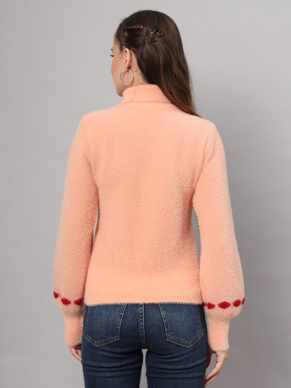 Women's peach and red fuzzy knit short-length winter sweater top with chevron pattern and high neckline