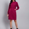 Woman in rani pink textured knit midi winter dress with long sleeves, round neck, and front pocket