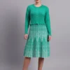 Women’s green cable knit acrylic wool fit & flare jumper dress with pearl buttons and pleated skirt