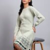 partnerimages_c6016e26_J9_PISTA_01_7 Woman wearing pista green knit winter dress with green and navy patterned hem, button front, and long sleeves