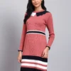 Woman in onion pink ribbed knit winter dress with navy scalloped collar, colorblock border, and long sleeves Woman in onion pink ribbed knit winter dress with navy scalloped collar, colorblock border, and long sleeves